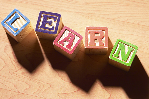 The word Learn spelled out in blocks